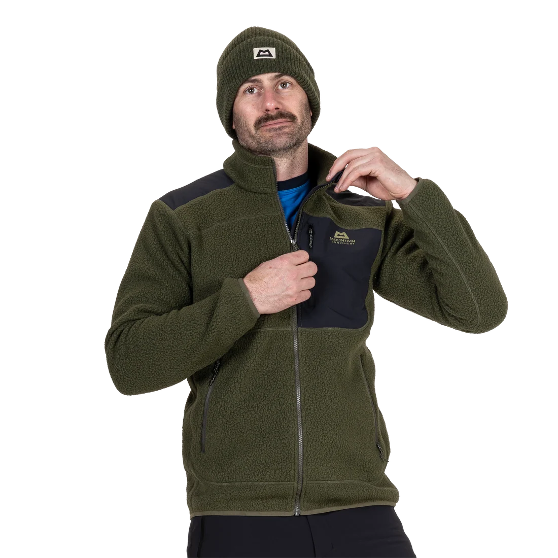A man wearing an olive green fleece zip-up jacket with dark navy shoulder panels and a matching olive green beanie, shown against a plain white background. Mountain Equipment Men's Highpile Jacket Buckthorn / Black