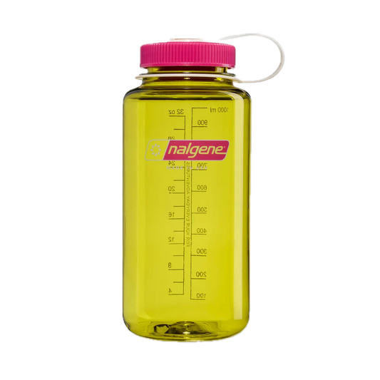 A translucent yellow Nalgene water bottle with a bright pink cap and white carrying loop, shown on a plain white background.